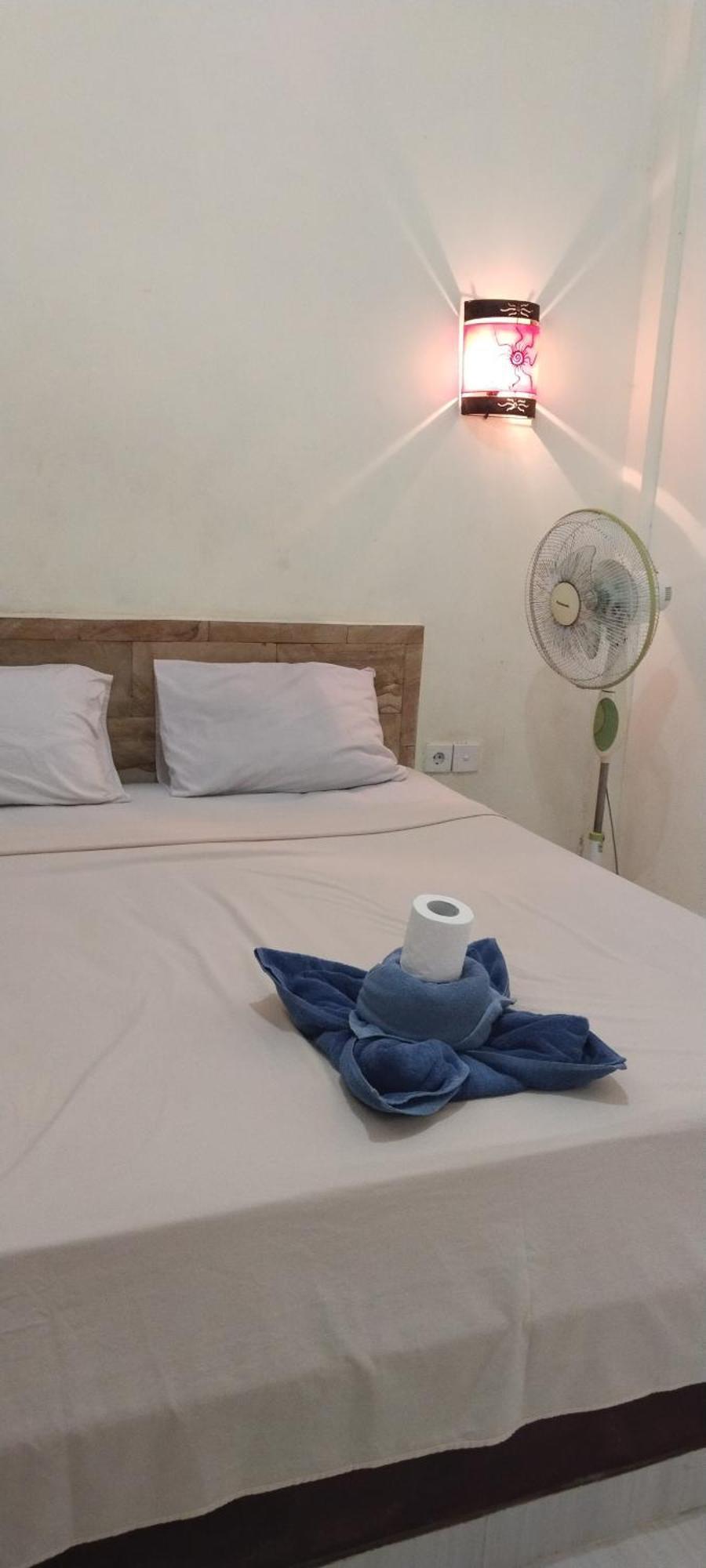 Amed Stop Inn Homestay, Rooftop Restaurant And Bar Екстер'єр фото