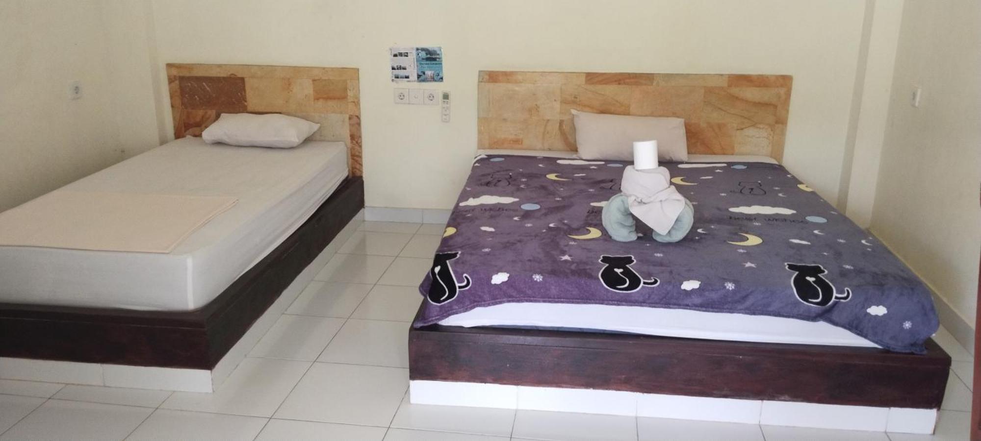 Amed Stop Inn Homestay, Rooftop Restaurant And Bar Екстер'єр фото