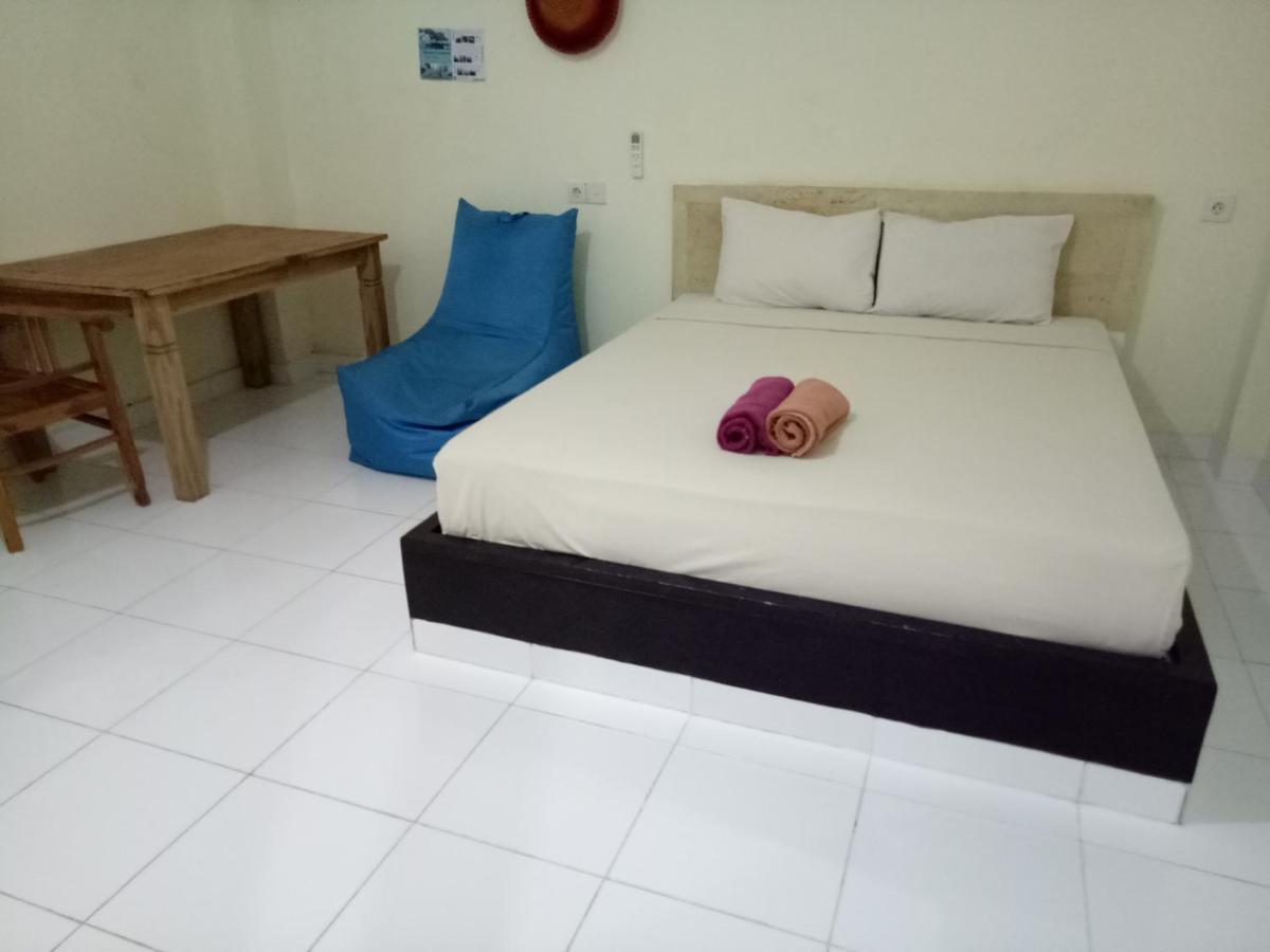 Amed Stop Inn Homestay, Rooftop Restaurant And Bar Екстер'єр фото